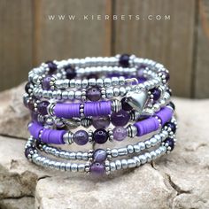 Amethyst: Amethyst is grounded in, tranquility, and calm. The literal meaning of Amethyst is “not intoxicated” -So wear bracelet this and party on! #gemstone #crystalhealing #gemstones #healingcrystals #healingstones #amethystjewelry #gemstonehealing #amethyststone #amethystgeode #birthstones #birthstonejewelry #februarybirthstone #birthstonenecklace #amethystring #amethystnecklace #jewelryaddict #bracelet #handmadejewelry Bohemian Silver Heart-shaped Beaded Bracelets, Bohemian Silver Beaded Heart Bracelets, Bohemian Purple Bracelets With Heart Beads, Bohemian Heart Beads Jewelry For Meditation, Meaning Of Amethyst, Rose Quartz Properties, Beaded Memory Wire Bracelets, Beaded Memory Wire, Amethyst Heart