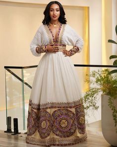 Traditional Ethiopian Wedding Dress, Ethiopian Graduation Dress, Habesha Graduation Dress, Eritrean Wedding Dress, Traditional V-neck Wedding Gown, V-neck Wedding Dress With Resham Embroidery, V-neck Kaftan With Dabka Work For Wedding, Intricate Embroidered Floor-length Wedding Dress, Traditional Floor-length Dress With Pearl Embroidery