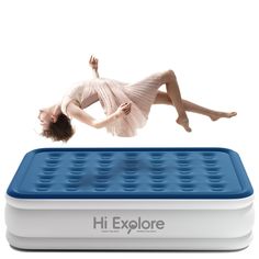 a woman is floating on top of an inflatable mattress that has been placed upside down