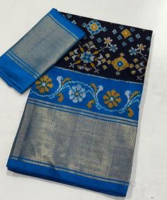 Step into the world of timeless elegance with this exquisite pure silk handloom Ikkat weaving saree. Featuring a rich dark blue base beautifully contrasted with a vibrant sky blue pallu and border, this saree is a masterpiece of traditional craftsmanship. The intricate Ikkat patterns are meticulously woven, showcasing the finest heritage of Indian weaving. Ideal for weddings, festive occasions, or special events, this saree brings together classic allure with modern grace. *Fabric: Pure Silk *We Blue Saree With Printed Border, Blue Saree With Printed Border For Festivals, Blue Unstitched Saree With Printed Border, Blue Tussar Silk Dupatta With Printed Border, Blue Traditional Saree With Printed Border, Blue Silk Traditional Wear With Handloom, Blue Silk Traditional Wear With Printed Border, Blue Dupatta With Printed Border For Diwali, Festive Blue Saree With Printed Border