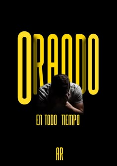 a man sitting in front of a black background with the words oroo written on it