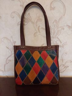 Multicolor Leather Rectangular Hobo Bag, Multicolor Handheld Shoulder Bag, Multicolor Leather Tote Bag, Multicolor Leather Pouch Bag, Multicolor Handheld Bags With Leather Handles, Multicolor Square Bag With Leather Handles, Multicolor Handheld Leather Shoulder Bag, Multicolor Hobo Tote Bag As Gift, Retro Leather Shoulder Bag As Gift