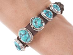 "Navajo Sterling Turquoise conchos leather bracelet. Selling the bracelet shown, No holes in the leather so never worn, can easily make a hole or holes for the perfect fit. All precious metals are tested and guaranteed, any Native American jewelry referred to as Silver or Sterling is guaranteed to be a minimum of 90% (coin) silver and possibly higher content. Anything marked is guaranteed to be what it's marked, most bracelets are photographed on a 6\" wrist (non hairy), rings photographed on th Western Style Turquoise Leather Bracelets, Turquoise Leather Concho Jewelry, Adjustable Turquoise Leather Bracelet With Concho, Turquoise Leather Concho Bracelets, Blue Vans, Cloth Tape, Types Of Packaging, Stone Inlay, American Jewelry