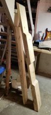 there is a ladder that has been made out of wooden planks in the workshop