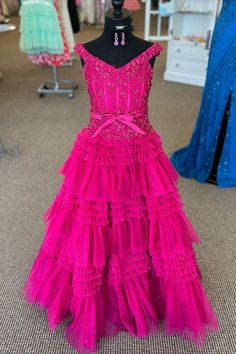 Modsele this girl pageant dress features spaghetti straps, banded waist and tiered skirt with ruffles. A perfect combination of elegance and sophistication for any special occasion.#hoco2023#homecomingdresses#formaldresses#homecoming#schooleventdress#holidaydress#graduationdress#cocktaildress Cheap Ruffled Princess Dress For Pageants, Luxury Ruffled Princess Dress For Pageants, Luxury Princess Pageant Dress With Ruffles, Luxury Ruffled Quinceanera Dress For Pageants, Luxury Elegant Pageant Dress With Ruffles, Luxury Sleeveless Pageant Dress With Ruffles, Cheap Twirl Dress With Ruffles For Playdate, Luxury Ruffled Pageant Dress For Wedding, 7th Grade Pageant Dresses