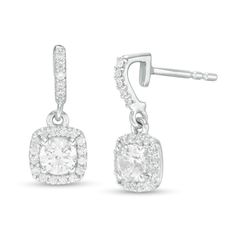 She'll appreciate the contemporary appeal of these smart diamond drop earrings. Fashioned in 14K white gold, each clever drop features a 1/4 ct. diamond sparkling a cushion-shaped frame of diamonds. The diamond-lined hook-shaped post adds further shimmer to the design. Radiant with 3/4 ct. t.w. of diamonds and a brilliant buffed luster, these earrings secure comfortably with friction backs. Cushion Cut Halo Setting Earrings, Formal Dangle Diamond Earrings With Halo Setting, Cushion Cut Sterling Silver Diamond Earrings For Formal Occasions, Modern Halo Design Diamond Earrings For Formal Occasions, Formal Cushion Cut Sterling Silver Diamond Earrings, Elegant Cushion Cut Diamond Earrings, Modern Halo Diamond Earrings For Formal Occasions, Classic Dangle Diamond Earrings With Halo Design, Classic Dangle Halo Diamond Earrings