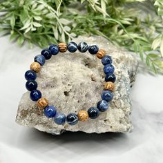 Sodalite and Palm Wood Unisex Bracelet - Artisan Made Adjustable Lapis Lazuli Beaded Bracelets For Meditation, Adjustable Sodalite Gemstone Beaded Bracelets, Artisan Handmade Bracelets For Meditation, Hand-strung Lapis Lazuli Spiritual Bracelets, Handmade Lapis Lazuli Bracelets For Meditation, Hand-strung Lapis Lazuli Bracelets For Meditation, Hand-strung Lapis Lazuli Bracelet For Meditation, Bohemian Lapis Lazuli Bracelet As A Gift, Bohemian Lapis Lazuli Beaded Bracelets As Gift