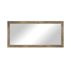 a wooden framed mirror on a white wall with a light brown frame and wood trim