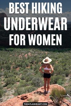 A woman wearing a sports bra, bike shorts, and a cowboy hat stands on a rock looking out at a desert valley, with the text overlay, "Best Hiking Underwear for Women." Through Hiking, Backpacking Clothes Women Hiking, Hiking Accessories For Women, Hiking Outfit Women Mountain, Hiking Essentials For Women, Hiking Gear Women, Utah Mighty 5