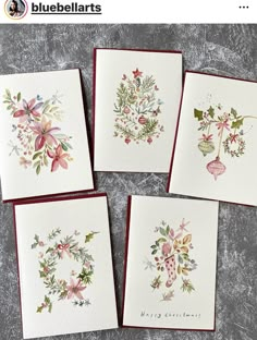 four greeting cards with floral designs on them