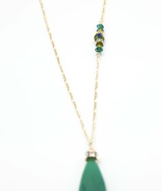 A large Emerald green Adventurine Crystal is adorned with a Swarovski Rhinestone rondelle and cap. 34”in length this amazing necklace is everyday wear or perfect for a dressy occasion. Dangles with easy movement from 14k gold fill or sterling silver. Extremely high quality chain and clasp with all closed jump rings. Side detail makes the necklace absolutely amazing, green Swarovski crystals. Available in Sterling silver or 14K gold fill chain.Custom Length available, just ask!Match with the Lind Elegant Green Long Necklace, Elegant Long Green Necklaces, Elegant Long Green Necklace, Elegant Green Long Necklace As Gift, Single Strand Green Jewelry For Party, Green Faceted Necklace For Party, Green Single Strand Jewelry For Party, Green May Birthstone Long Drop Jewelry, Elegant Green Long Necklace For Party