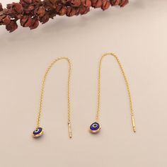 Special Dainty Evil Eye Earring  - Elegant and High-Quality Gift This elegant Earring is the perfect gift option for your loved ones. Featuring unique Evil Eye designs , this earring is available in both silver and gold options. Crafted from high-quality materials, it stands out with its sophisticated charm. The earring comes with an adjustable chain, allowing it to be worn at different lengths to suit personal preferences. It is presented in a beautiful gift box, making it a special experience Dainty Sterling Silver Linear Earrings With Adjustable Chain, Gold Sterling Silver Threader Earrings, Dangle Linear Earrings With Adjustable Chain As Gift, Sterling Silver Dangle Threader Earrings, Sterling Silver Dangle Threader Earrings For Jewelry Making, Adjustable Dangle Linear Earrings As Gift, Dainty Tarnish Resistant Threader Earrings As Gift, Yellow Gold Threader Earrings With Adjustable Chain, Silver 14k Gold Threader Earrings As Gift