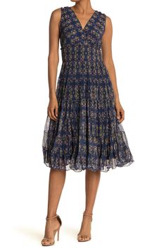 A sleeveless A-line midi dress features a paneled flared skirt with a mesh print for feminine style. Surplice neck. Sleeveless. Slips on over head. Paneled A-line skirt. Mesh exterior. Lined. Approx. 44.5" length (size S). ImportedAvailable in:. Dot print (NVRDDTVB). Floral print (BKMNRLFL, BLKBLWFL) Chelsea Wedding, Mesh Midi Dress, Work Style, Max Studio, Flared Skirt, Work Fashion, Nordstrom Dresses, Dot Print, Flare Skirt