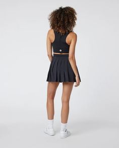 Set Dress | Black Tennis Dress with Built in Shorts | Vuori Fitted Dress With Pleated Flared Skirt, Fitted Flared Skirt Dress For Night Out, Chic Fitted A-line Tennis Skirt, Pleated Flared Skirt Dress For Night Out, Chic Fitted Dress With Flared Skirt, Fitted Pleated Skirted Dresses, Chic Skirted Dress For Night Out, Casual Fitted Dress With Lined Skirt, Stretch Pleated Skirt Dress