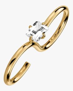 Crafted from 9k yellow gold this understated ring features a double-wrap design puncuated with stunning white topaz for a modern look. Note: this ring is a two finger ring.The size 3 will be 3-4.75 the size 5.5 will be 3.75-5.5 and the 6.5 will be 4.5-6.5. This piece is made to order just for you so please allow 3-6 weeks for your item to ship. This item is final sale. 9K yellow gold with 14k yellow gold setting and white topaz White topaz: 2.35 tcw Store individually in protective case clean wi Two Finger Ring, Formal Jewelry, Gold Topaz, Jewelry Stones, Woman Jewelry, Ring Styles, Precious Jewels, Knuckle Rings, Yellow Gold Setting