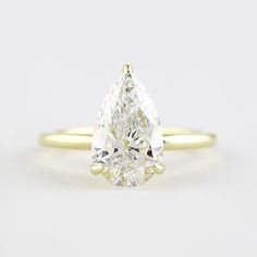 2 Carat Pear Cut Hidden Halo Engagement Ring Moissanite Engagement Ring Solitaire, Types Of Diamonds, Sparkling Diamond, Diamond Anniversary, Hidden Halo, Round Moissanite, Diamond Solitaire Engagement Ring, Ring Sizes, Designer Engagement Rings