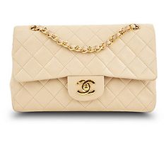 Tote your necessities in timeless elegance when you have this pre-owned double flap shoulder bag, showcasing an iconic quilted diamond pattern, an upscale chain strap, and a spacious interior. From Chanel. Classic White Bag With Cc Turnlock Closure, Classic White Double Flap Bag, Classic Gold Bag With Cc Turnlock Closure, Beige Formal Bags With Double Flap, Classic Beige Double Flap Bags, Beige Double Flap Bag For Formal Occasions, Formal Beige Bags With Double Flap, Formal Beige Double Flap Bags, Classic Beige Shoulder Bag With Double Flap