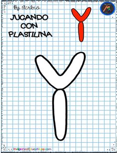 an image of the letter y in spanish on a piece of graph paper with scissors