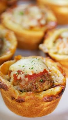 mini meat and cheese quiche cups on a plate