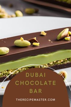 there is a chocolate bar with pistachios on it and the text overlay reads, dubai chocolate bar