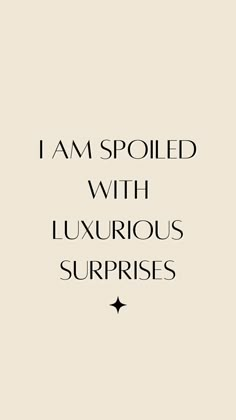 the words i am spoiled with luxurious surprises written in black on a beige background