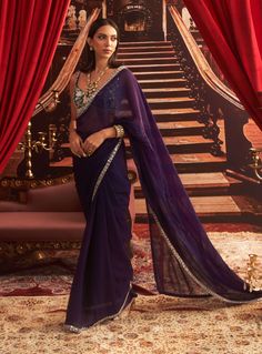 Step into elegance with this purple embellished blouse, complemented by a flowing organza sari and petticoat. The delicate embellishments enhance the blouse, while the lightweight organza drapes beautifully, creating a stunning look that's perfect for any festive celebration. Purple Organza Saree, Organza Sari, Saree For Wedding, Vacuum Storage, Ready To Wear Saree, Indian Wedding Wear, Embellished Blouse, Sleeves Blouse, Desi Girl