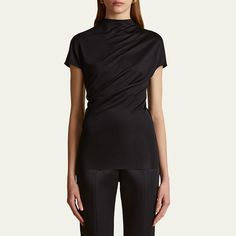 Khaite "Zenn" jersey top Mock neckline Short sleeves Relaxed fit Pullover style Viscose Dry clean Made in Portugal Mock Neckline, Jersey Top, Bergdorf Goodman, Top Designers, Pullover Styling, Mock Neck, Tops Designs, Portugal, Dry Clean