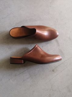 Slip Ons Women shoes, Leather Slides, Leather shoes women, Mule Shoes brown, rounded Toe shoes, Womens Leather Mules, brown Leather Mules Can be orderd in other colors. Leather covered heels. We use the finest leather and the most comfortable shoe shape. We use a manufactured durable sole so that you can enjoy the most out of these gorgeous shoes. All My shoes are handmade, created with careful attention to comfort, detail and style. Shoe Details: * Color - brown * Upper Materials: Fine Soft Lea Brown Slip-on Mules For Fall, Brown Leather Slip-on Shoes With Low Heel, Brown Leather Shoes With Medium Width Flat Heel, Brown Leather Shoes With Flat Heel, Brown Leather Footbed Mules, Brown Leather Mules With Leather Sole, Brown Leather Shoes With Removable Insole, Formal Brown Mules With Rubber Sole, Brown Low Heel Mules With Stacked Heel