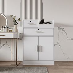 a bathroom with marble walls and flooring next to a white cabinet, mirror and sink