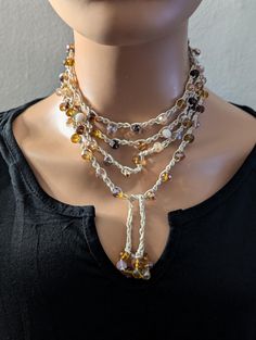 Elevate your style with this exquisite long wrap-around crystal beaded crochet necklace. Handcrafted with love, this stunning piece features an array of shimmering crystals intricately woven into delicate crochet work. Perfect for any occasion, whether dressing up for an evening out or adding a touch of elegance to your everyday look. Versatile and timeless, this necklace can be wrapped multiple times for a layered effect or worn long for a more dramatic statement. A must-have accessory for anyone who appreciates handmade artistry and bohemian charm. This simple design makes it easy to dress up or down for any occasion. measuring 75 inches this beautiful necklace can be worn in many different styles and will make a fantastic addition to your wardrobe. *My goal is to make sure you receive e Beaded Crochet Necklace, Handmade Boho Jewelry, Delicate Crochet, Beaded Crochet, Crochet Work, Bead Crochet, Jewelry Unique, Handmade Boho, Beautiful Necklace