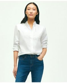 Our shirt is crafted from Oxford cotton with our signature button-down collar and 6-Pleat Shirring® at the cuff, for a nod to timeless American style. Classic silhouette that is straight in the bodyEmbroidered logo at chest100% CottonMachine washImported | Women's Classic-Fit Cotton Oxford Shirt | White | Size 2 Classic Dress Shirt For Everyday Spring Wear, Classic Everyday Dress Shirt For Spring, Classic Daywear Blouse, Classic Shirt With Spread Collar For Everyday, Classic Everyday Shirt With Spread Collar, Classic Fitted Everyday Shirt, Classic Everyday Tops, Classic Dress Shirt With Relaxed Fit For Everyday, Classic Button-up Shirt For Daywear