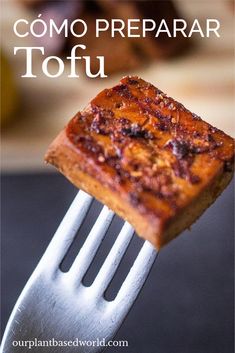 a close up of a fork with food on it