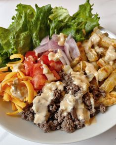 a white plate topped with different types of food