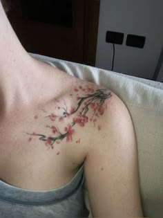 a woman with a tattoo on her chest