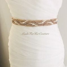 Please choose your ribbon color from the drop down menu. Add glamour to your wedding dress with this gold rhinestone pearl heirloom bridal sash belt. The sash is embellished with high quality glass crystals. The satin sash ribbon is approximately 3.5 yards long. The ribbon is available in many other colors. Measurements: Ribbon is available in two different widths: 5/8 inch 1.5 inches Embellishment is approximately 1 inches wide at the widest point and available in different lengths. Processing: Elegant Embellished Party Sash, Elegant Gold Bridal Accessories With Sashes, Elegant Gold Belts, Elegant Pearl Embellished Sashes For Party, Gold Embroidered Bridal Belt For Wedding, Elegant Bridesmaid Belts With Sashes, Elegant Gold Sashes With Embroidered Belt, Elegant Gold Bridal Belt For Bride, Elegant Gold Bridal Belt