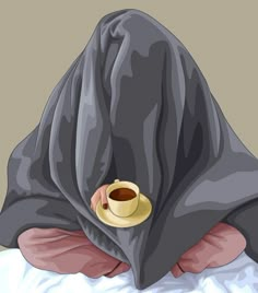 a person wrapped in a blanket with a cup of coffee on their lap under the covers