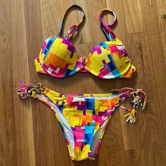 Multicolor, Bright Bikini Push Up Top Adjustable Straps. Size Medium. Raisins Bikini Set Multicolor Moisture-wicking Swimwear For Beach, Beachwear Multicolor Swimwear With Built-in Bra, Bright Bikinis, Multicolor V-neck Stretch Swimwear, Bohemian Multicolor V-neck Swimwear, Multicolor Stretch V-neck Swimwear, Pink Yellow, Push Up, Womens Swim