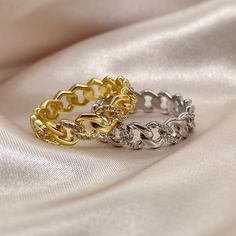 This Cuban statement ring is made with Sterling Silver and 18k Gold Vermeil. Enjoy them stacked with other rings or on its own! A fun addition to your jewelry collection! M A T E R I A L S > SOLID STERLING SILVER (925) > 18K GOLD VERMEIL (HEAVY PLATING) > CUBIC ZIRCONIA D I M E N S I O N S > 6.0MM * C A R E INSTRUCTIONS * ~ Simple instructions to care for the jewelry is not expose to chemicals like bleach, chlorine, hairspray, to avoid chemical reactions or breakdown of materials. (Just as you w Gold Plated Silver Chain Ring With Adjustable Chain, Elegant Metal Chain Ring For Anniversary, Silver Tarnish-resistant Chain Promise Ring, Silver Tarnish-resistant Chain Ring, Cubic Zirconia Chain Ring For Gift, Cubic Zirconia Chain Ring As A Gift, Silver Gold-plated Stackable Promise Rings, Elegant Metal Chain Ring For Promises, Gift Cubic Zirconia Chain Ring