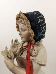 VICTORIAN CHILD’S VELVET BONNET W EMBROIDERY & LACE RUFFLE BRIM DATING TO THE VICTORIAN 19TH CENTURY FASHIONED OF A BLACK SILK VELVET THAT IS HAND EMBROIDERED ON EACH SIDE.   THE CENTER OF THE BONNET IS IN SILK WITH PIPED DETAILING WITH NET RUFFLES TRIMMING AROUND THE BRIM AND ALL AROUND THE BOTTOM.   CONDITION:  THE BOTTOM EDGE WIRE WAS ORIGINALLY COVERED IN SILK BUT MOST OF THE SILK IS ABSENT AND I PERSONALLY WOULD REMOVE.  SMALL WEAR I SEEN TO THE PIPING ON THE REAR HEAD, THE INTERIOR LINING Velvet Bonnet, Costume Room, Victorian Bonnet, Victorian Shawl, Victorian Children's Clothing, Victorian Child, Medieval Hats, Edwardian Hat, Historical Hats