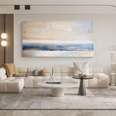 a living room filled with furniture and a large painting on the wall above it's couches