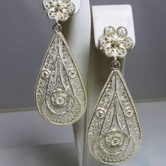 High Detail & Quality Fascinating "Frosted" .925 Sterling Silver Diamond Cut Filigree 2 Piece Drop / Dangle Earrings Stud & Butterfly Fasteners Size = 2 1/2" Drop Width = 1" Weighs = 6.1 Grams Each Dangle Filigree Bridal Earrings, White Teardrop Earrings With Intricate Design, Silver Filigree Earrings For Party, Ornate White Sterling Silver Earrings, White Filigree Drop Earrings, Formal Filigree Clip-on Earrings, Ornate White Pierced Earrings, White Intricate Design Dangle Earrings, White Intricate Design Drop Earrings