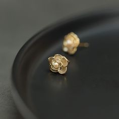 Why We Made This Our Dainty Jasmine Flower Stud Earrings, exquisitely designed to capture the delicate beauty of jasmine blossoms, are a perfect blend of romance and elegance. The delicate design and symbolic meaning of jasmine blossoms make these earrings a thoughtful and stylish addition to any jewelry collection. Whether worn daily or on special occasions, they beautifully convey love, sensuality, and grace. Product Details MADE FROM 925 Sterling Silver with 18K gold coating, Freshwater Pearl Elegant Petal-shaped Blossom Jewelry, Elegant Blossom Earrings For Gift, Delicate Flower Earrings As A Gift For Her, Dainty Flower Earrings For Anniversary, Elegant Blossom Color Flower Earrings For Gift, Classic Flower Earrings For Formal Occasions, Delicate Flower Charm Earrings For Her, Delicate Flower Charm Earrings As Gift For Her, Feminine Flower Pearl Earrings For Gift