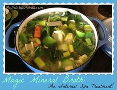 a pot filled with vegetables sitting on top of a stove