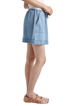 Keep the look low-key and relaxed in this light-wash lyocell-denim miniskirt topped with a drawstring waist. Drawstring waist Front scoop pockets 100% Tencel® lyocell Tencel lyocell is a more-sustainably produced fiber made with closed-loop processing Machine wash, tumble dry Imported Spring Relaxed Fit Skort With Pockets, Casual Washed Blue Denim Skirt For Summer, Cotton Mini Bottoms For Daywear, Light Wash Short Cotton Denim Skirt, Cotton Mini Length Bottoms For Daywear, Casual Mini-length Skort With Drawstring, Casual Summer Denim Skirt Relaxed Fit, Casual Relaxed Fit Denim Summer Skirt, Casual Mini Skort With Drawstring