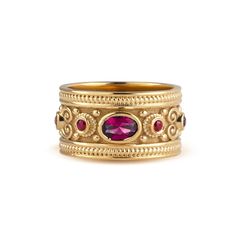 A beautiful Byzantine-style inspired ring. *real images of the ring, taken by us* Dimensions: 11mm width Gemstones: - Simulated Ruby (cubic zirconia) Material: - Sterling Silver (925) - 9K Gold (375) - 14K Gold (585) - 18K Gold (750) *All signet rings are hallmarked on the back for certification* - We offer FREE Worldwide DHL & FedEx Shipping! - Branded DanelianJewelry Gift Box with each order! Our customer service is available 7 days a week. Leave us your message, and we will get back to you wi Byzantine Ring, Etruscan Jewelry, Medieval Ring, Byzantine Rings, Byzantine Jewelry, Medieval Rings, Ruby Ring Gold, Historical Jewellery, Gold Gemstone Ring