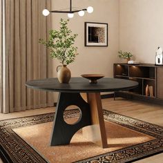 a dining room table with two vases on it and a rug in the middle