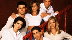 the cast of friends posing for a photo