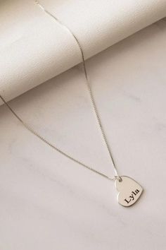 💎 Make her day with this dainty custom heart necklace! 🌟 Personalize it with an initial or name, and give the perfect gift for any occasion. A charming, minimalist piece she’ll treasure forever. 💖 #CustomJewelry #MinimalistNecklace #GiftForHer 🎀 Silver Heart Necklace With Adjustable Chain As Gift, Valentine's Day Heart Cut Adjustable Necklace, Minimalist Necklace With Heart Charm For Personalized Gift, Heart Cut Adjustable Necklace For Valentine's Day, Adjustable Heart Necklace, Adjustable Heart Cut Necklace With Heart Charm, Gift Heart Necklace With Adjustable Sterling Silver Chain, Minimalist Heart-shaped Personalized Name Necklace, Minimalist Heart Name Necklace For Personalized Gift