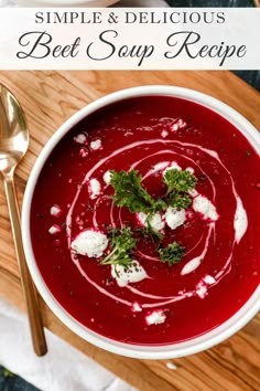 a bowl of beet soup with feta cheese and parsley in the middle