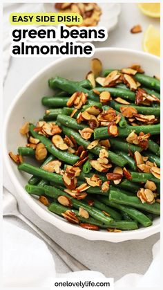 green beans and almonds in a white bowl with the words easy side dish on top